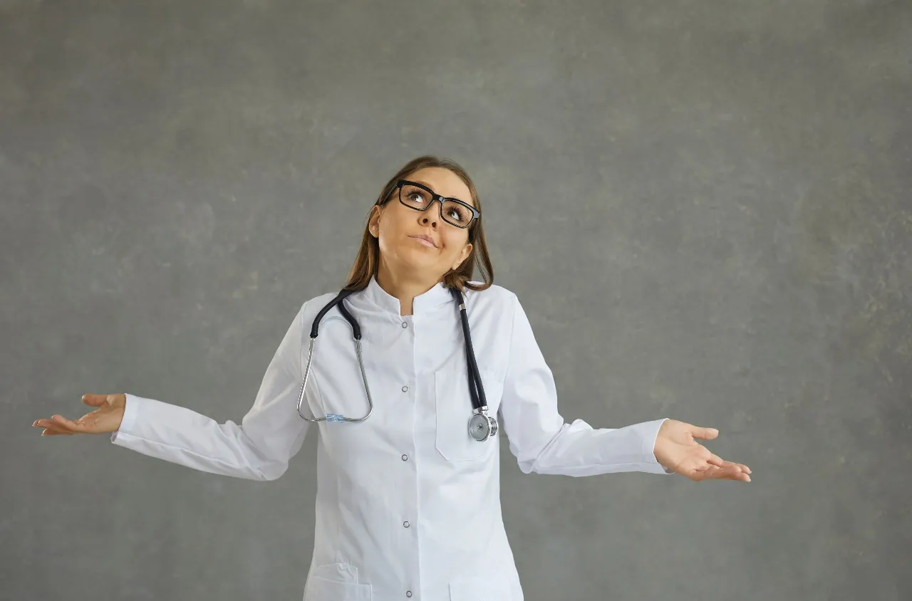 picture of a nurse with hands in air doesn't know how to balance